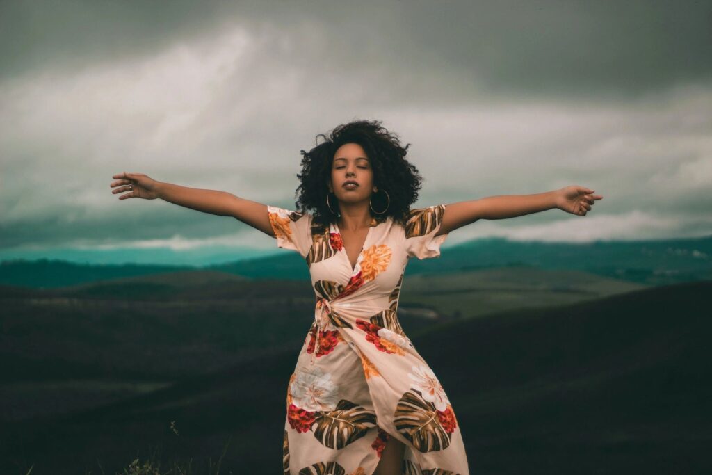 woman surrendering to God